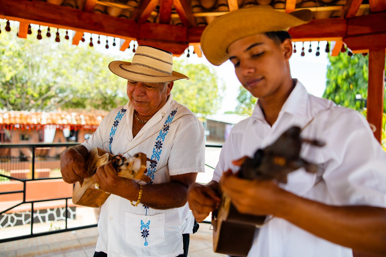 Two Panamanian musicians playing mejorana at La Villa de Los Santos, Las Tablas, Los Santos Province, Panamá